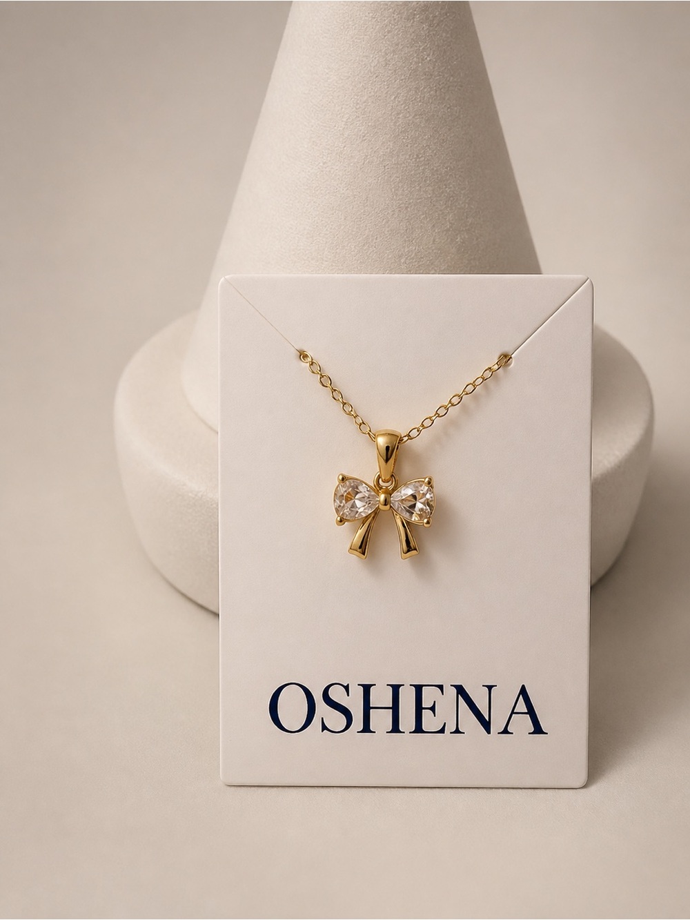 Oshena Gold Bow Pendant Necklace with Clear Stones
